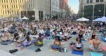 Heat doesn’t stop hundreds of Hoosiers from doing yoga on the circle