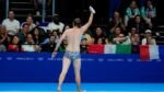 Speedo-wearing man at Olympics swimming event