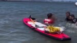 Teen swimming in rising California waters gets stuck in mud in edge of your seat video