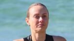 Sylvia Jeffreys shows off her fit figure in a sporty one-piece as she braves the cold for an early morning swim at Bronte Beach