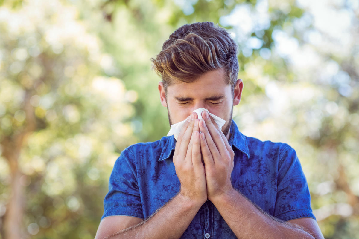 Summer colds and flu are more common than you think. Here's how to tell if you have one — and how to treat it.