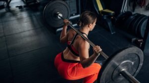 Master The Barbell Back Squat With This Golf Club Hack