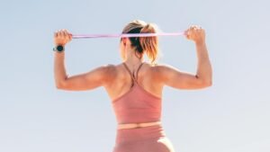 I ditched the gym and tried this back strengthening resistance band workout instead — here’s what happened to my upper body